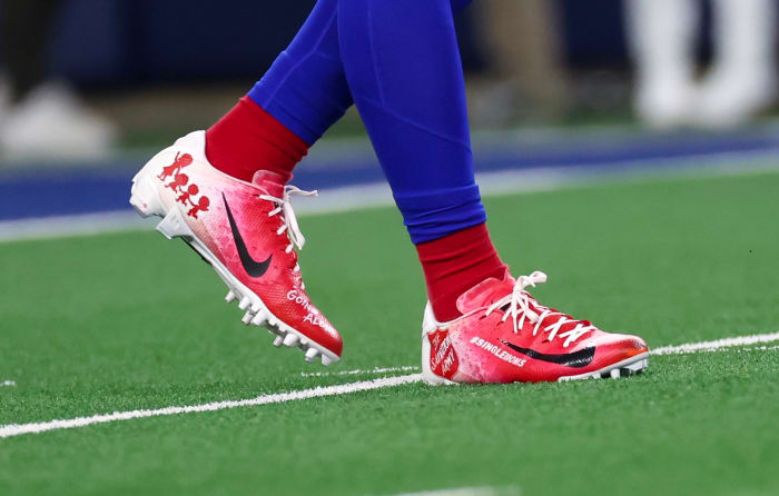 View of red and white cleats.